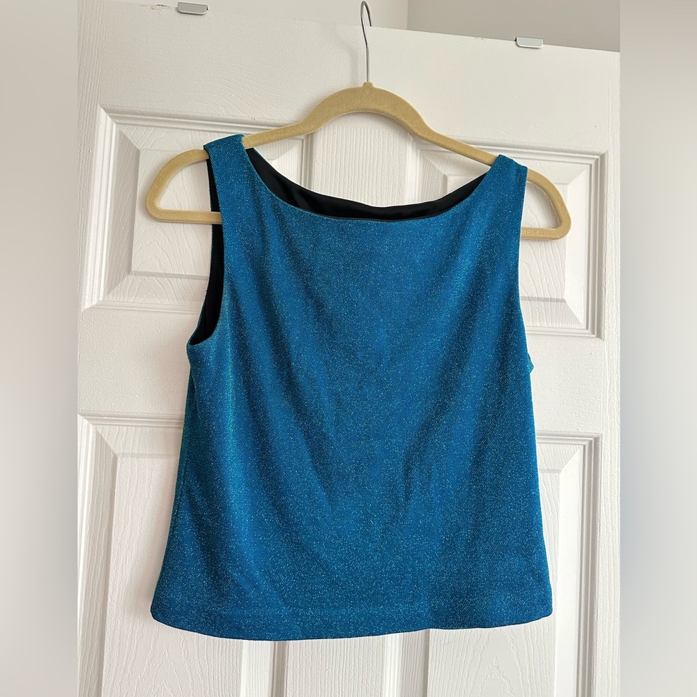 Cache blue sparkly top size 6